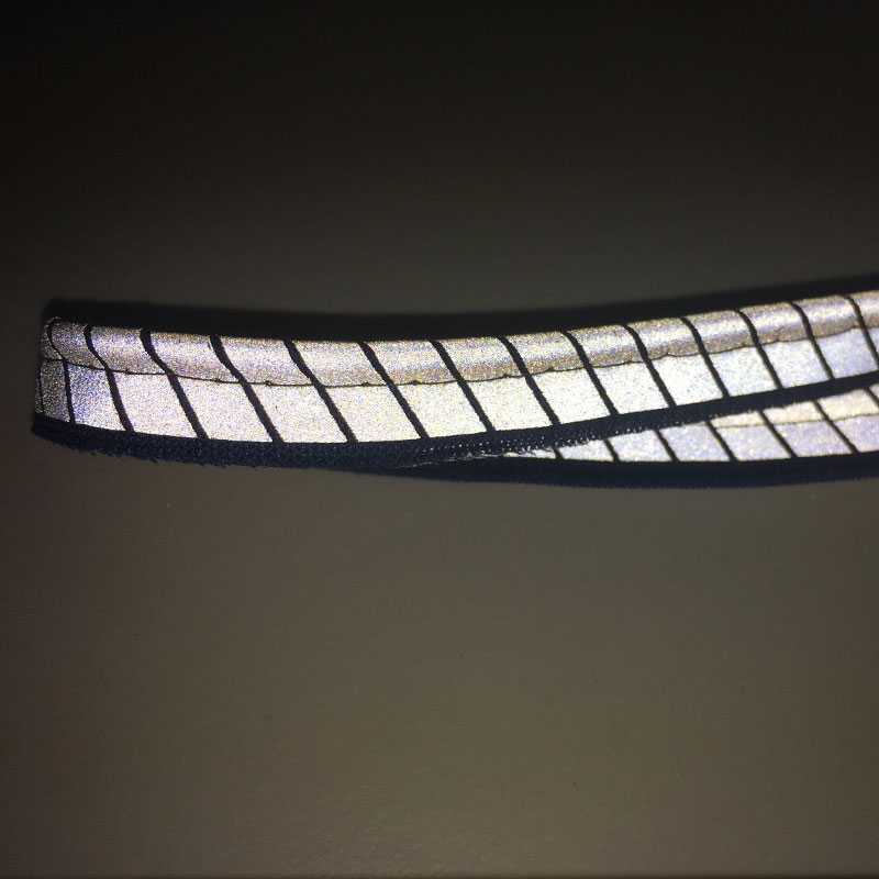 Segmented reflective piping tape